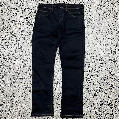 RECONSTRUCTED PAINKILLER BY JOY DIVIZN WAX DENIM PANTS: