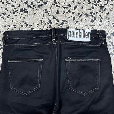 RECONSTRUCTED PAINKILLER BY JOY DIVIZN WAX DENIM PANTS: