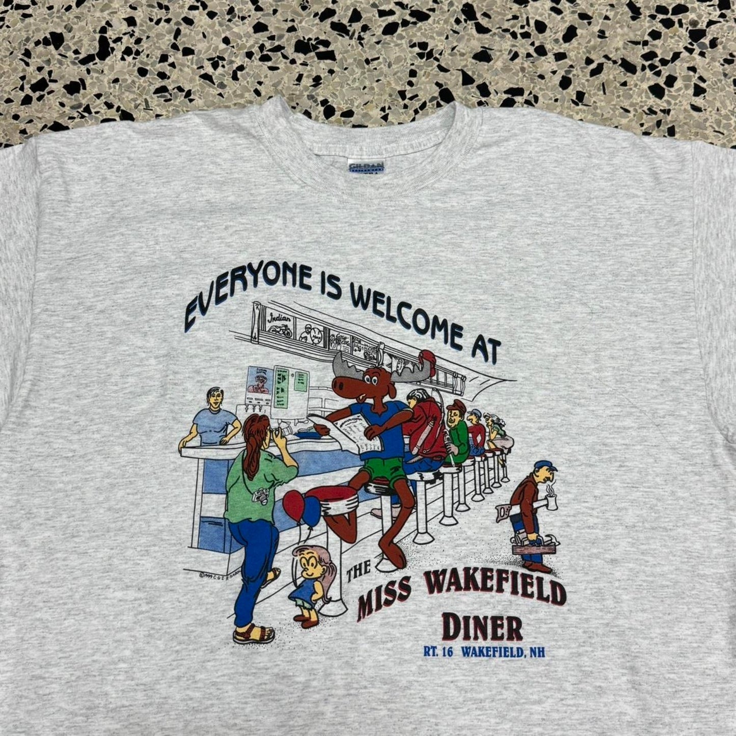 VINTAGE 90S 1999 EVERYONE IS WELCOME AT THE MISS WAKEFIELD DINER MOOSE TEE: