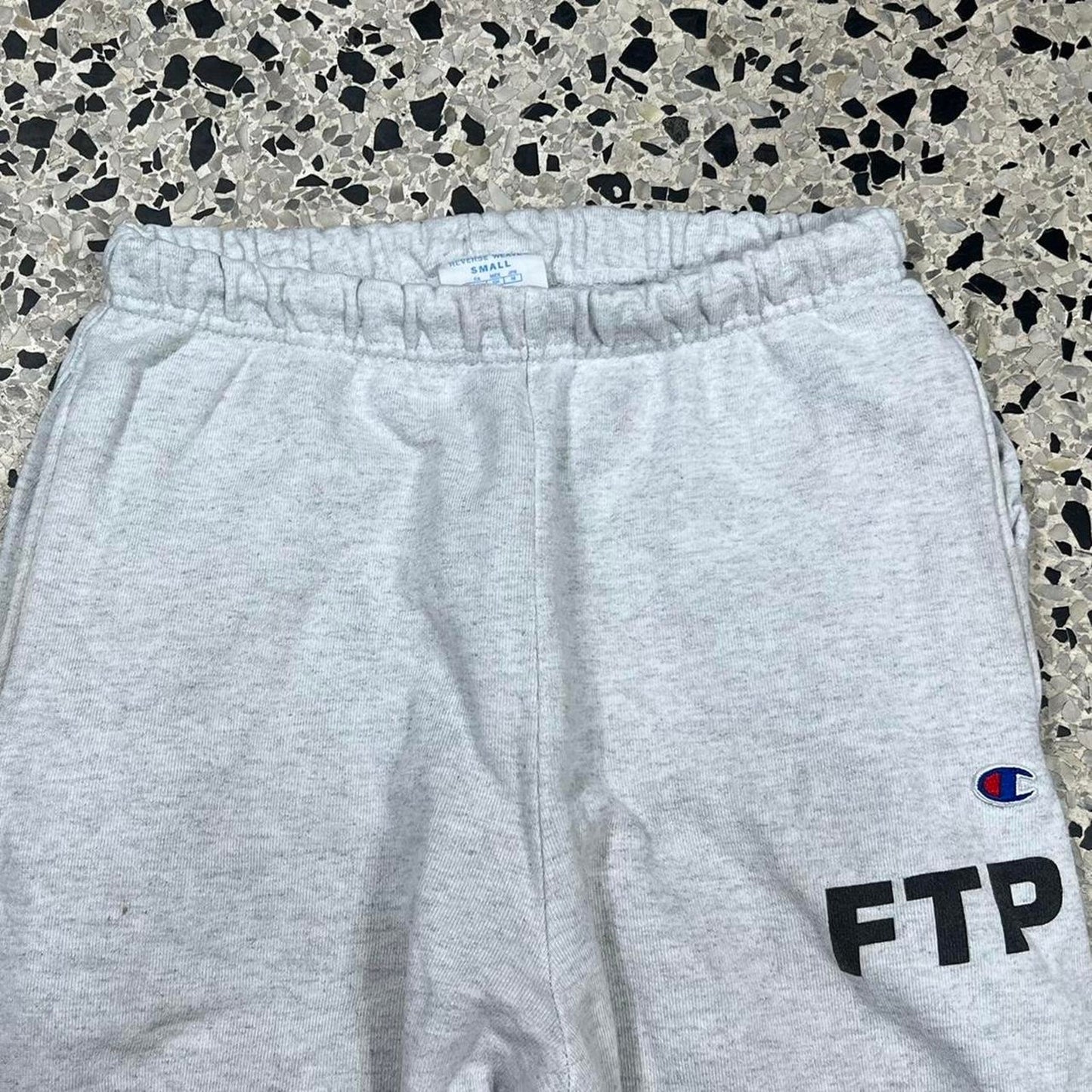 FTP X CHAMPION SCREEN PRINTED LOGO SWEATPANTS: