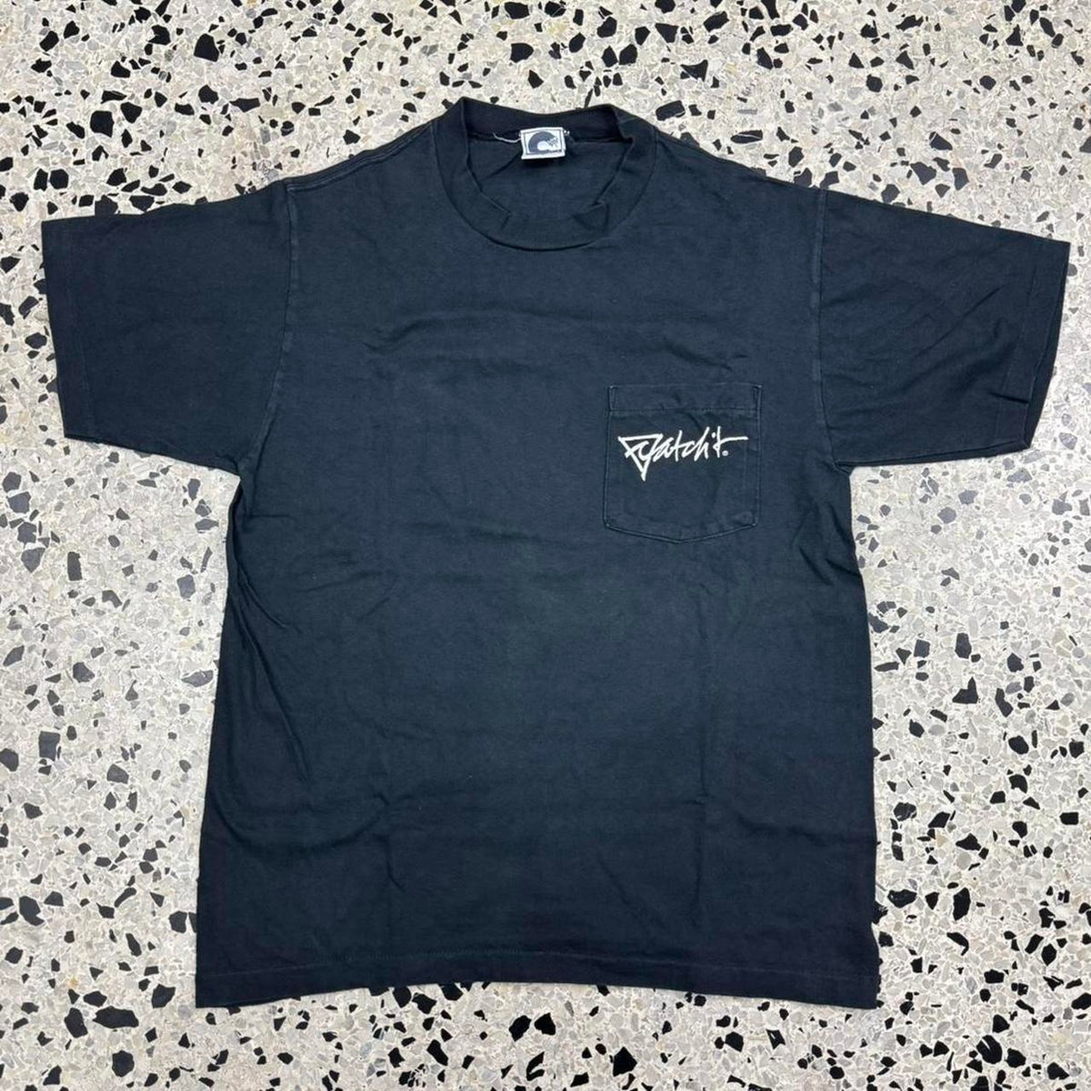 VINTAGE 90S SINGLE STITCH CATCH IT WORLD CONCERN ABSTRACT SURF POCKET TEE: