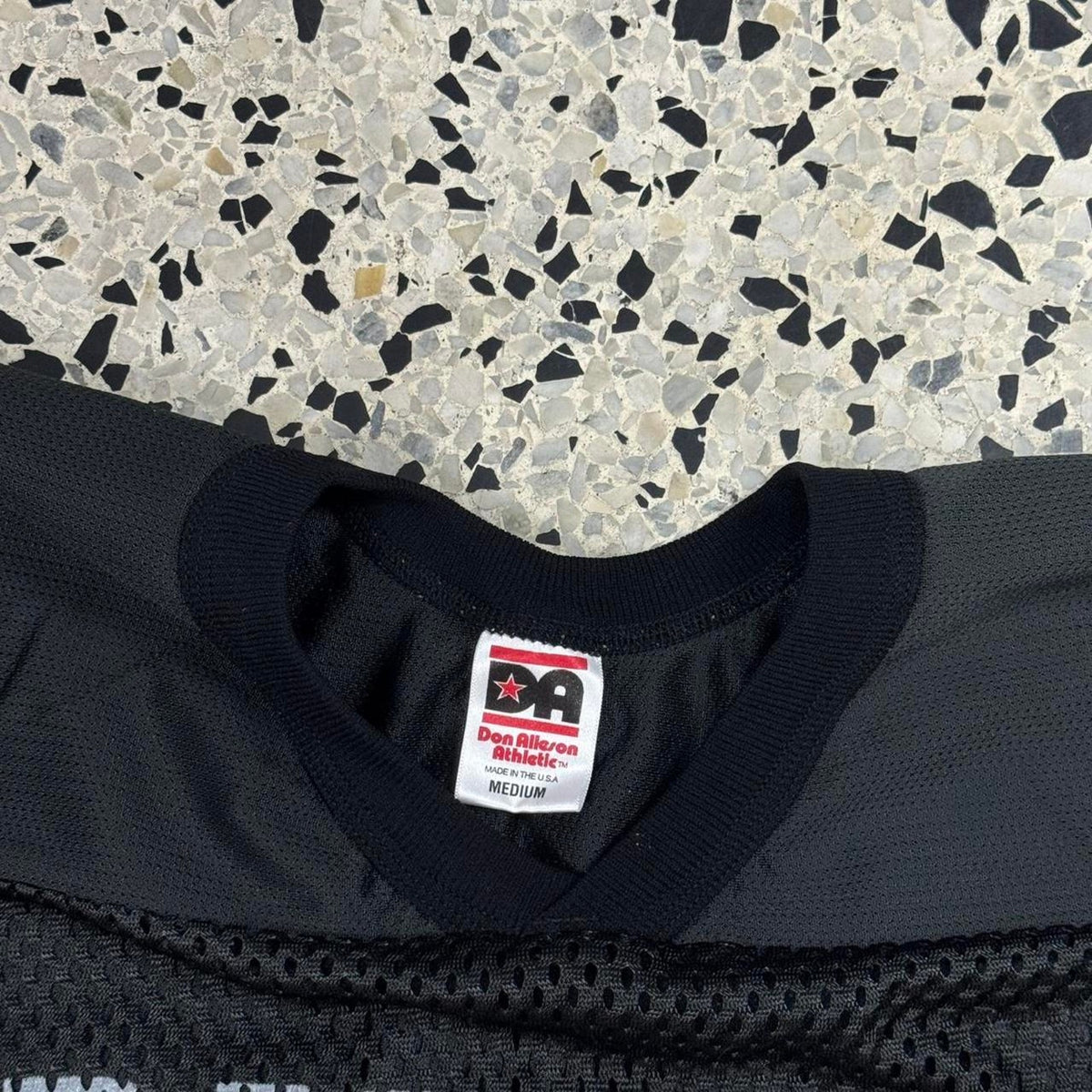 VINTAGE 90S Y2K RAIDERS FOOTBALL MESH SLEEVELESS JERSEY: