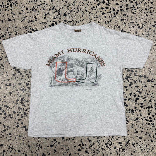 VINTAGE 90S SINGLE STITCH NUTMEG UNIVERSITY OF MIAMI ACTION SHOT EMBROIDERED TEE: