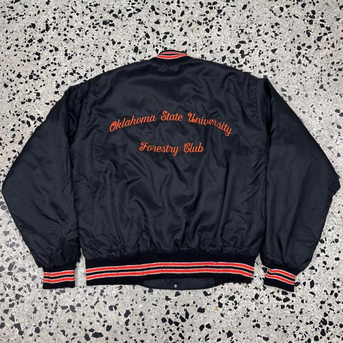 VINTAGE 80S WEST WIND OKLAHOMA STATE UNIVERSITY FORESTRY CLUB NYLON VARSITY JACKET: