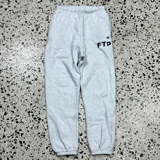 FTP X CHAMPION SCREEN PRINTED LOGO SWEATPANTS: