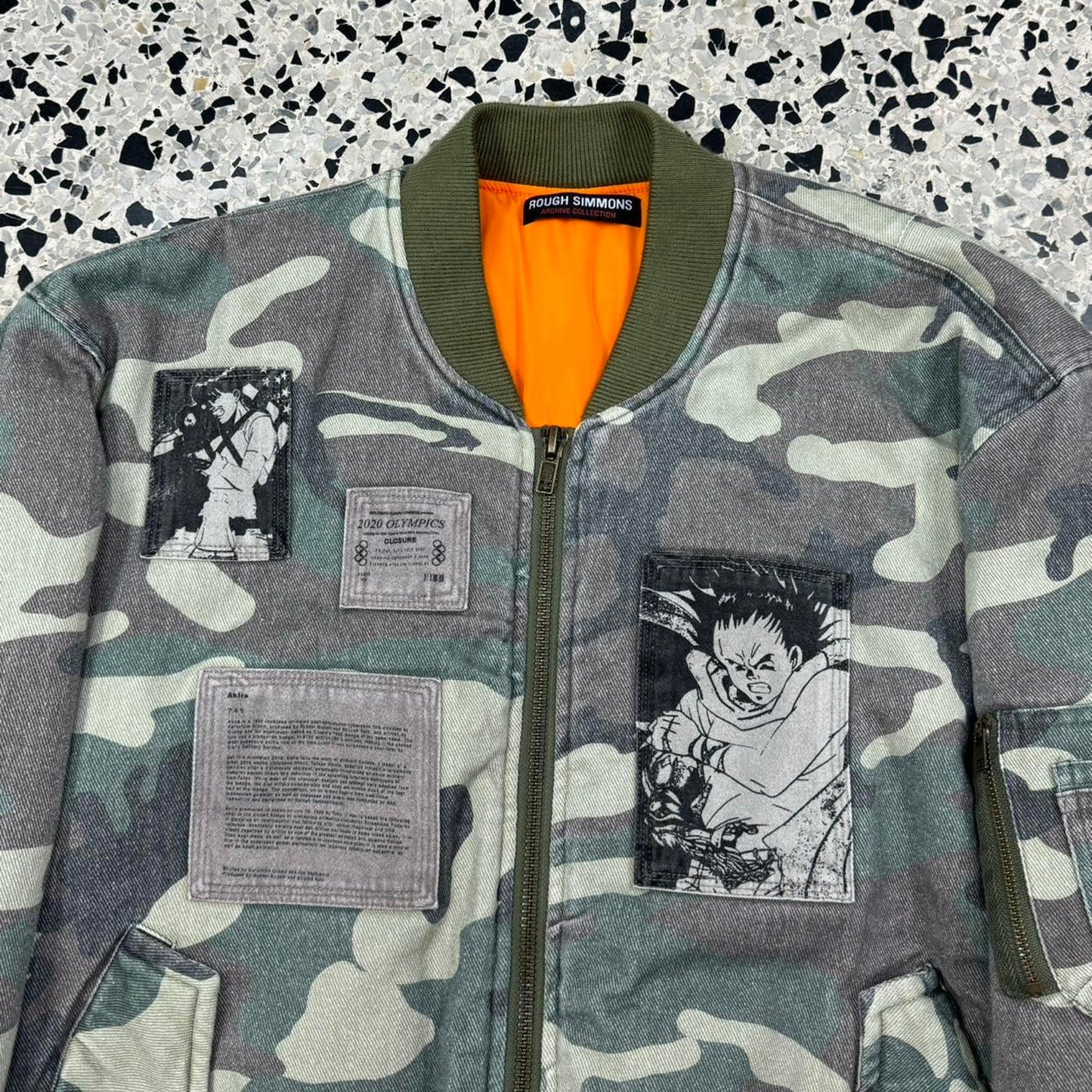 ROUGH SIMMONS NEOTOKYO AKIRA BOMBER CAMO PATCHWORK JACKET: