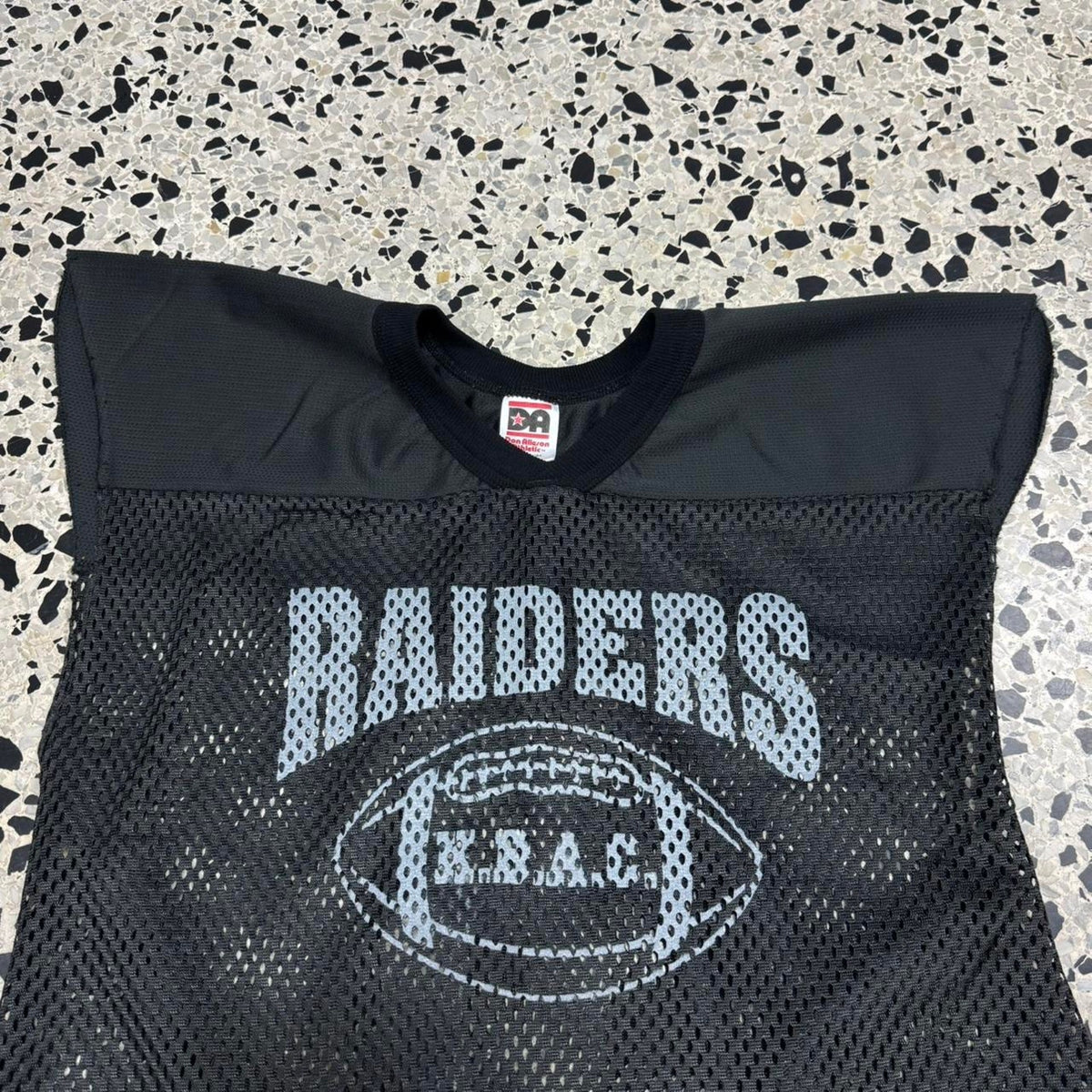VINTAGE 90S Y2K RAIDERS FOOTBALL MESH SLEEVELESS JERSEY: